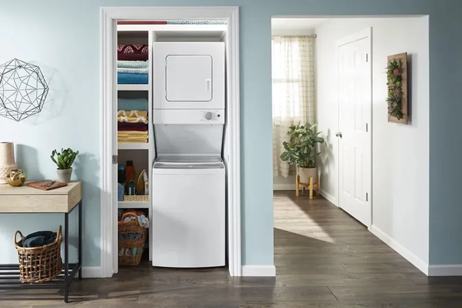 Whirlpool WET4024HW stacked electric laundry center (top-load washer) for maximizing space efficiency and fitting laundry into small closets.